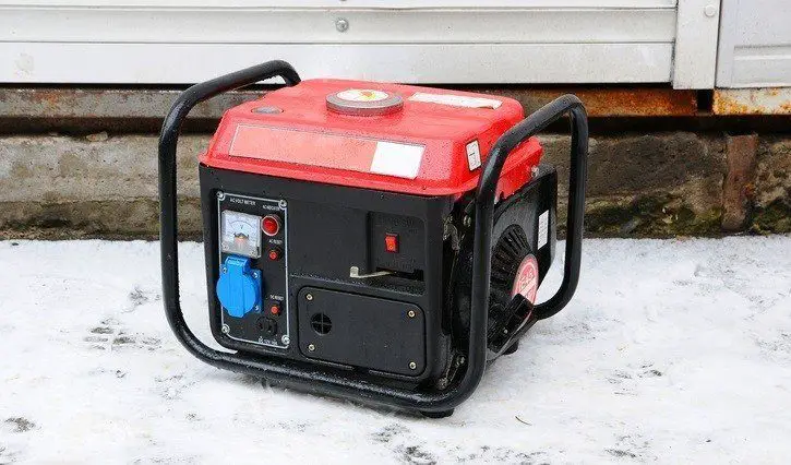 a red and black petrol generator
