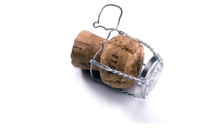 champagne cork in cage