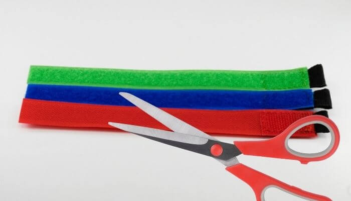 use scissors to shorten the hook side of the velcro